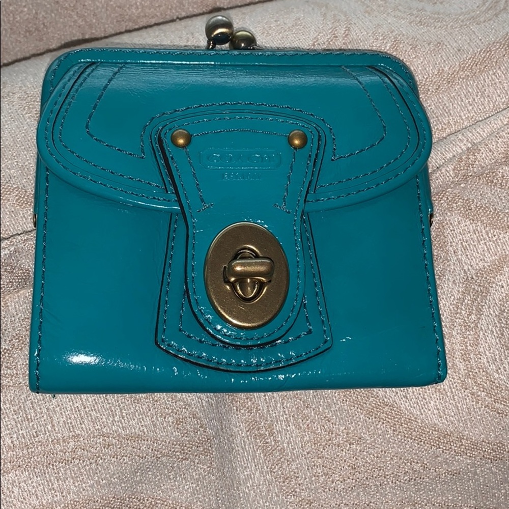 Turquoise coach wallet with legacy lining
